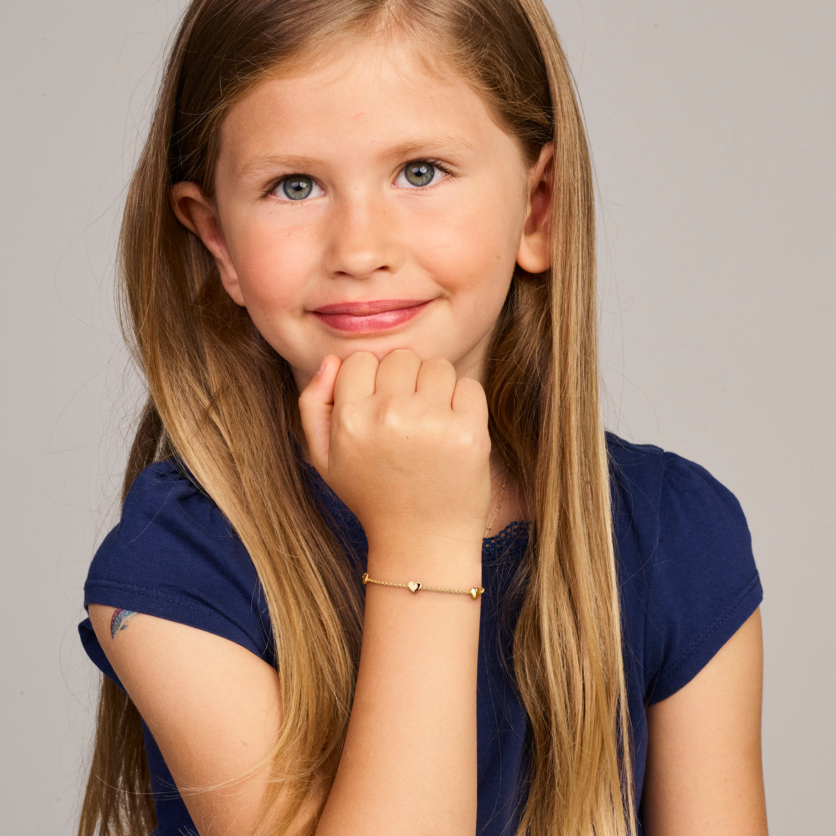 14K Geelgouden Kinderarmband met Hartjes 11-13 cm - aanzicht 2
