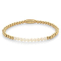 Rebel & Rose Pearl Gem meets Yellowgold armband 4 mm - wit en goudkleurig