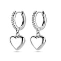 Zilver gerhodineerd hartjes oorringen / creolen